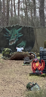 Haggicorn sat on top of cuddles the demon dog for protection.